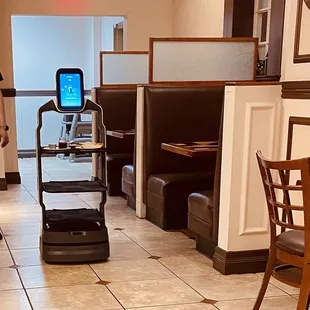 a woman using a treadmill in a restaurant