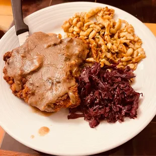 Jaeger schnitzel with spaetzle  and red cabbage