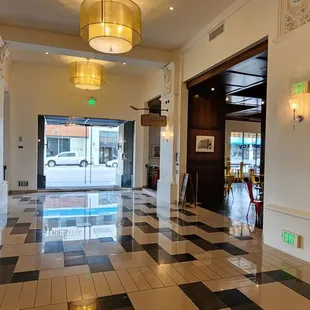 the entrance to a hotel lobby