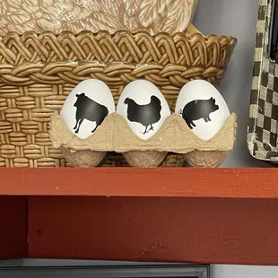 Fun and family-oriented personal decor. Lots of pigs and cows   family photos and magazine articles.