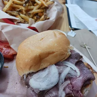 Pit beet with raw onions, fresh cut fries.