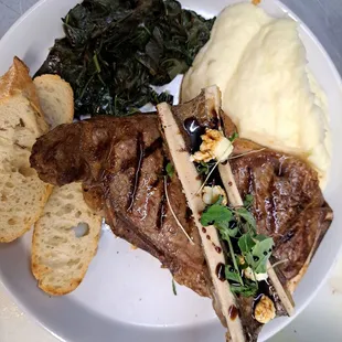 KS Strip Steak, roasted marrow, mashed potatoes, local greens @ Farmacy Grill