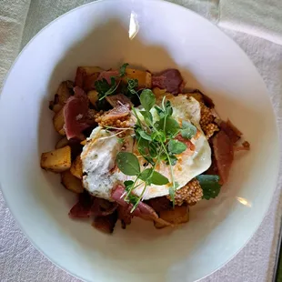 Brunch Hash with local egg  @Farmacy Grill