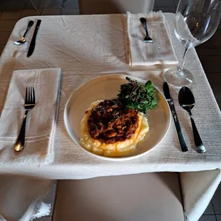 Pulled short ribs with local sautéed greens and whipped potatoes at Farmacy Grill