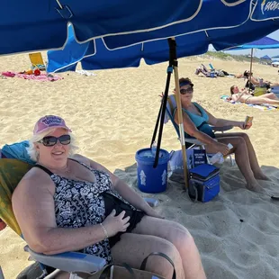 Relaxing at Nags Head with Farm Dog chairs and umbrellas!