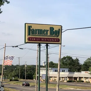 a sign for a farmer boy restaurant