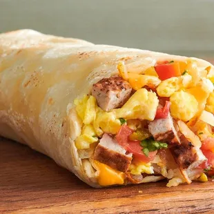 a breakfast burrito cut in half