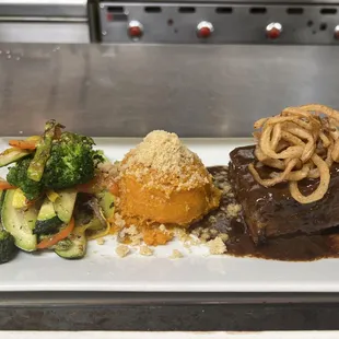 Farmer Brown's Braised Short Rib ,Smashed Sweet Potato ,Brown Sugar Strussel , Boneless Beef Short Rib ,Summer Vegetable Medley . ( special)