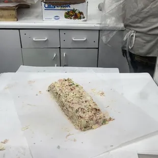 a roll of bread on a table