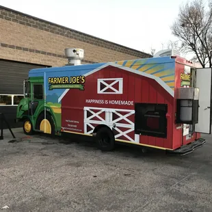 a food truck parked in front of a building
