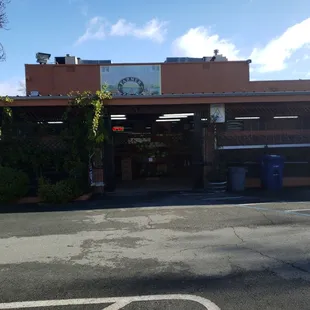 Entrance and pretty empty parking lot at 9 am Thursday