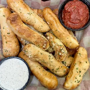 Barn Bread - 
A dozen (12) topped with Garlic Butter, Parmesan and Parsley
