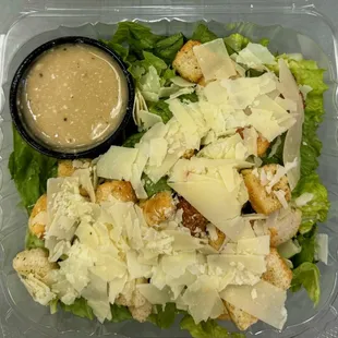 Caesar Salad - 
Romaine, Parmesan Cheese, Croutons and Caesar Dressing
