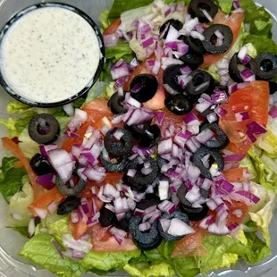 Farmhouse Salad - 
Romaine, Red Onion, Sliced Tomato, Black Olives and your choice of Salad Dressing