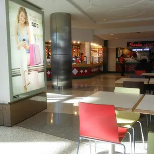 tables and chairs in a mall