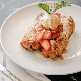 French toast with strawberries and syrup