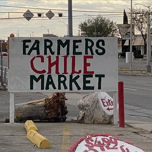 a sign on the side of the road