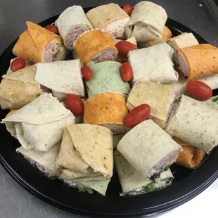 a platter of sandwiches