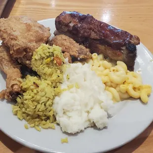 Fried chicken, ribs, mac n cheese, mashed potatoes and yellow rice pilaf