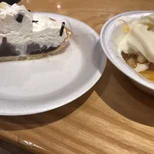 Chocolate pie and peach cobbler with vanilla ice cream.
