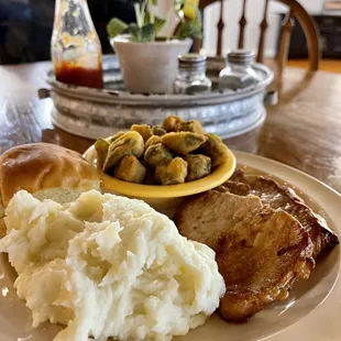 Pork Chops,  mashed potatoes,  fried okra.