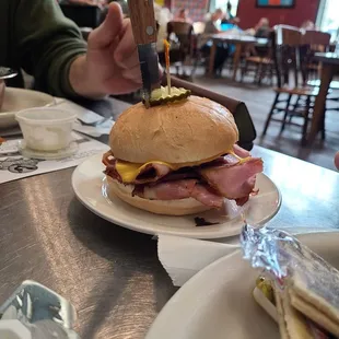 a sandwich on a plate with a knife
