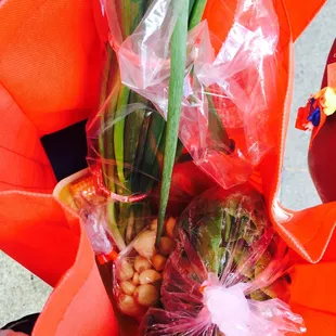 Baby Bok Choy, Bag of peeled garlic, Ginger, Green onions, Maui onions, 4 Corn on the cob =$11