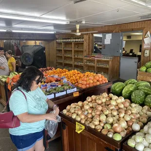 a woman shopping for produce