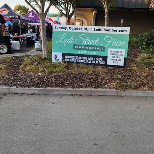 a sign for the farmers market