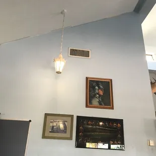 light fixture and framed pictures