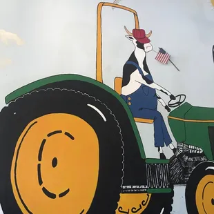 a farmer driving a tractor