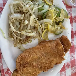 Oops almost took a bite- My fried catfish with cracker crust , cabbage and squash 4.75 stars! Yum $17.99 10/10/24
