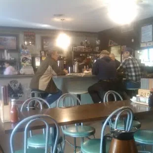 the &quot;regulars&quot; having coffee at the counter