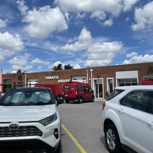 Across from the farmers market. Cute eateries.