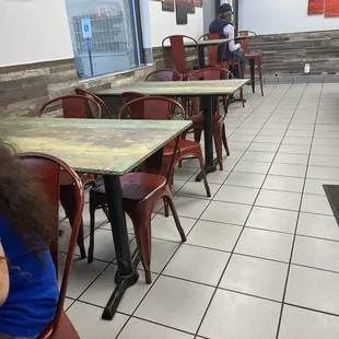3 tables for 4 people and 2 tables that seat 2 people