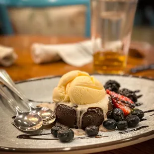 lava cake with blueberries and ice cream