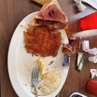 a plate of breakfast food on a table