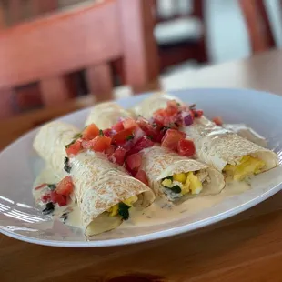 a plate of breakfast burritos