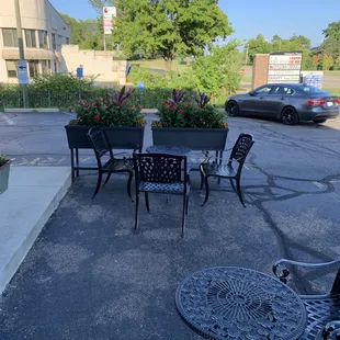 Outside tables in front of business