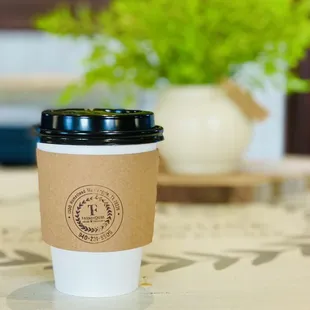 a cup of coffee on a table