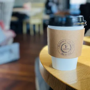 a coffee cup on a table