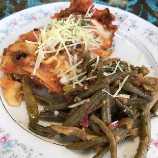 Meat lasagna and tomato green beans