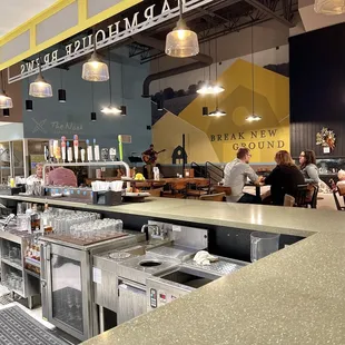 Sitting at the bar, listening to live music