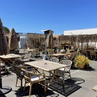 Outdoor seating area that transports you to somewhere tropical.