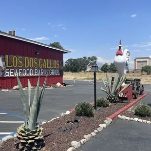 The coolest rooster statue ever it's actually the reason we stopped in.