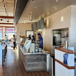 a view of the kitchen from the dining area