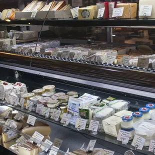 Farmstead cheeses come from milk from the cheese-maker's own herd, Artisanal cheeses are like a co-op, made from milk of neighboring herds.