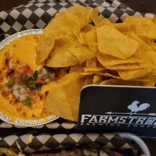 Queso with their beer cheese