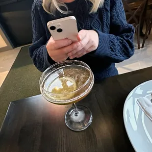 a woman looking at her phone