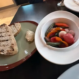Grilled sourdough and butter plus a side of freshly pickled veggies.